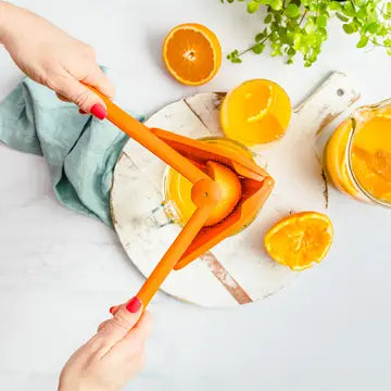 Fluicer, Orange - Fold Flat Easy Juicer