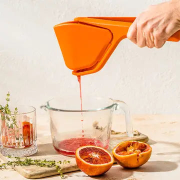Fluicer, Orange - Fold Flat Easy Juicer